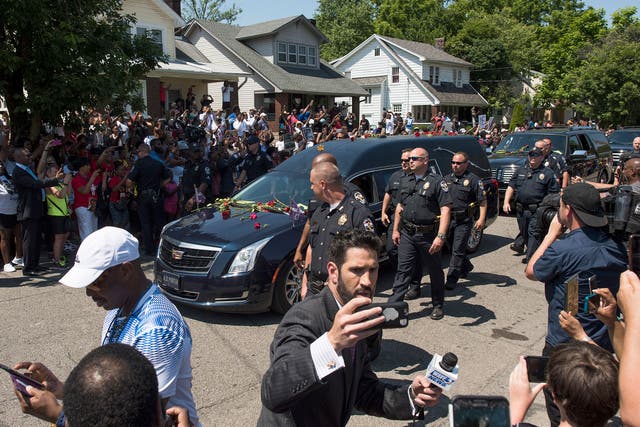 The funeral procession for Muhammad Ali makes its way through Louisville