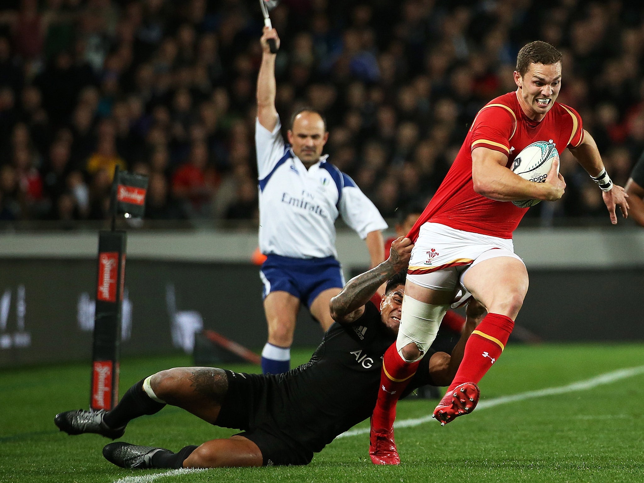 George North is tackled by Malakai Fekitoa