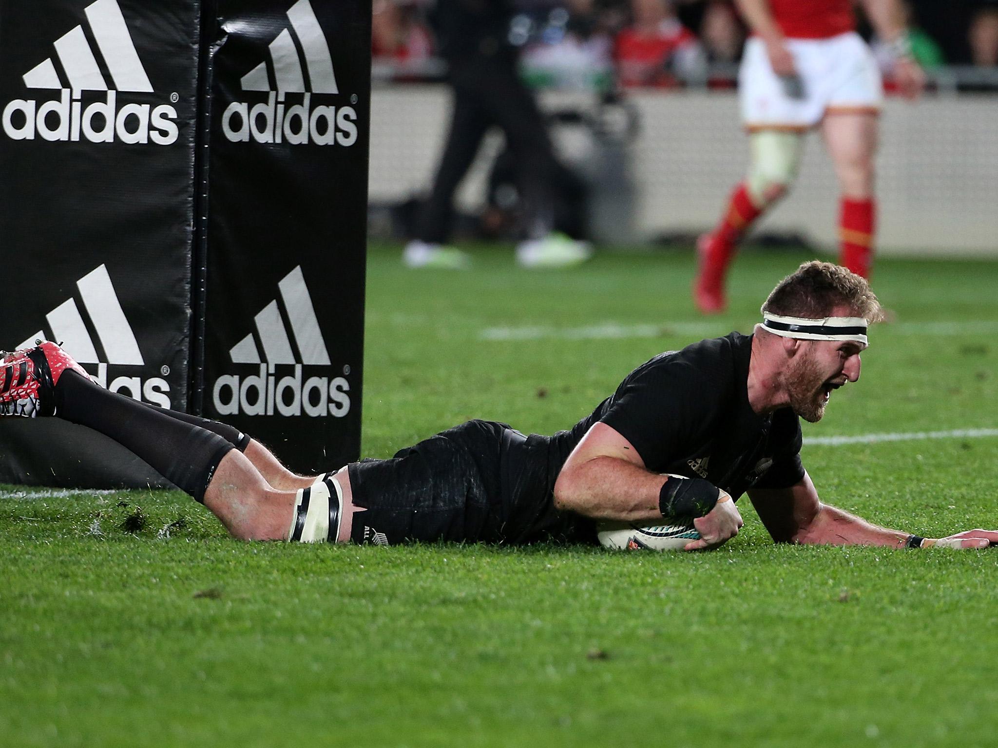 New Zealand captain Kieran Read scores a try against Wales