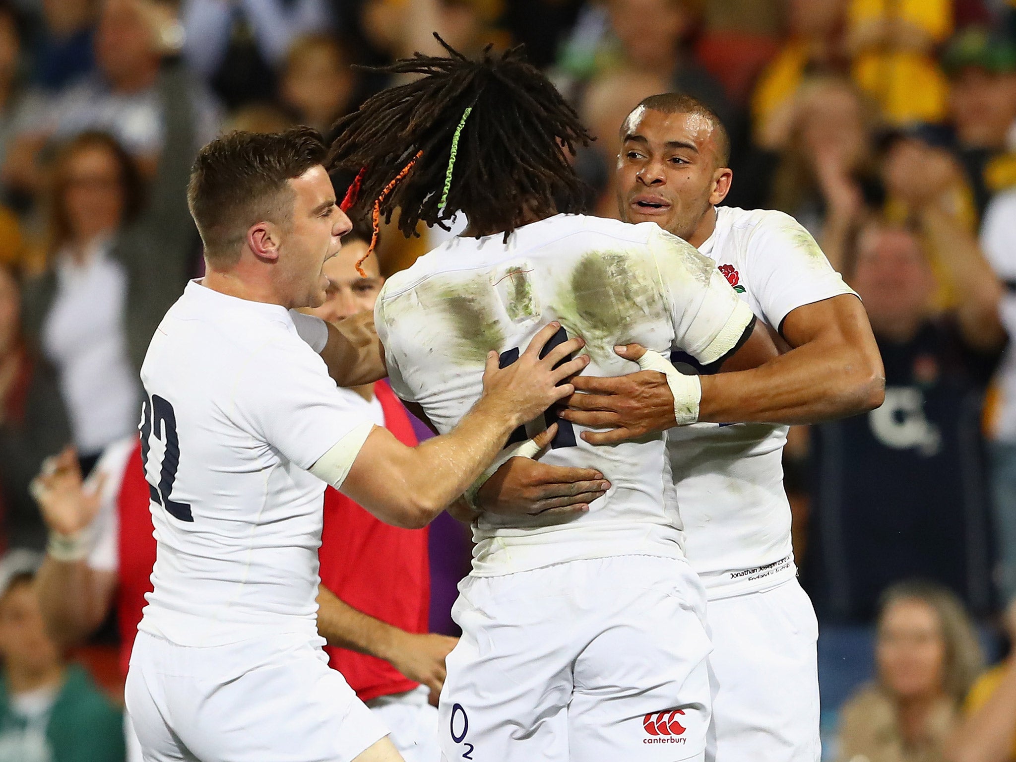 George Ford and Marland Yarde celebrate after Jonathan Joseph scores a try