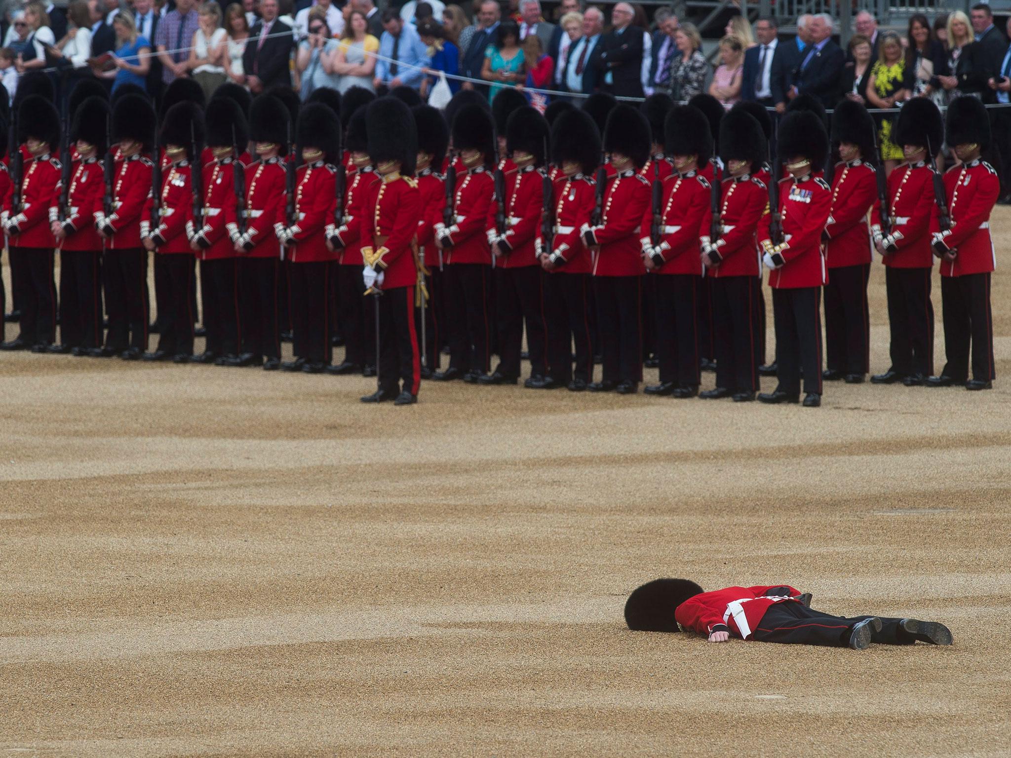 Guardsman collapses during Trooping of the Colour parade at Queen's