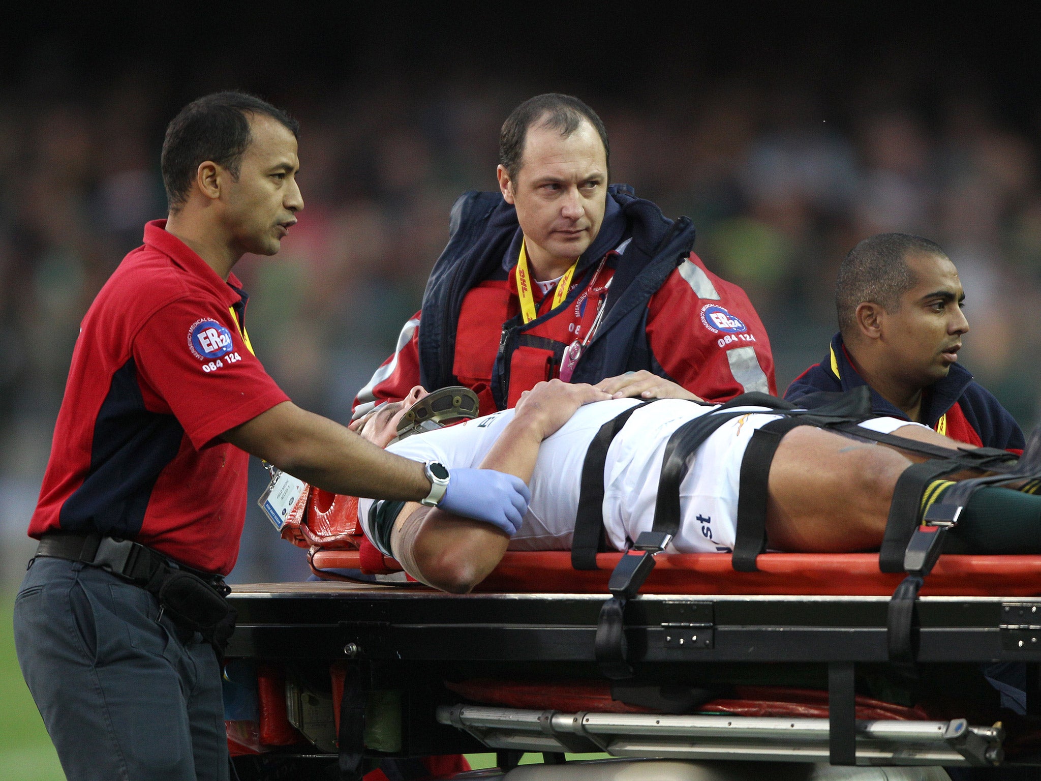 Pat Lambie is taken off the field on a stretcher