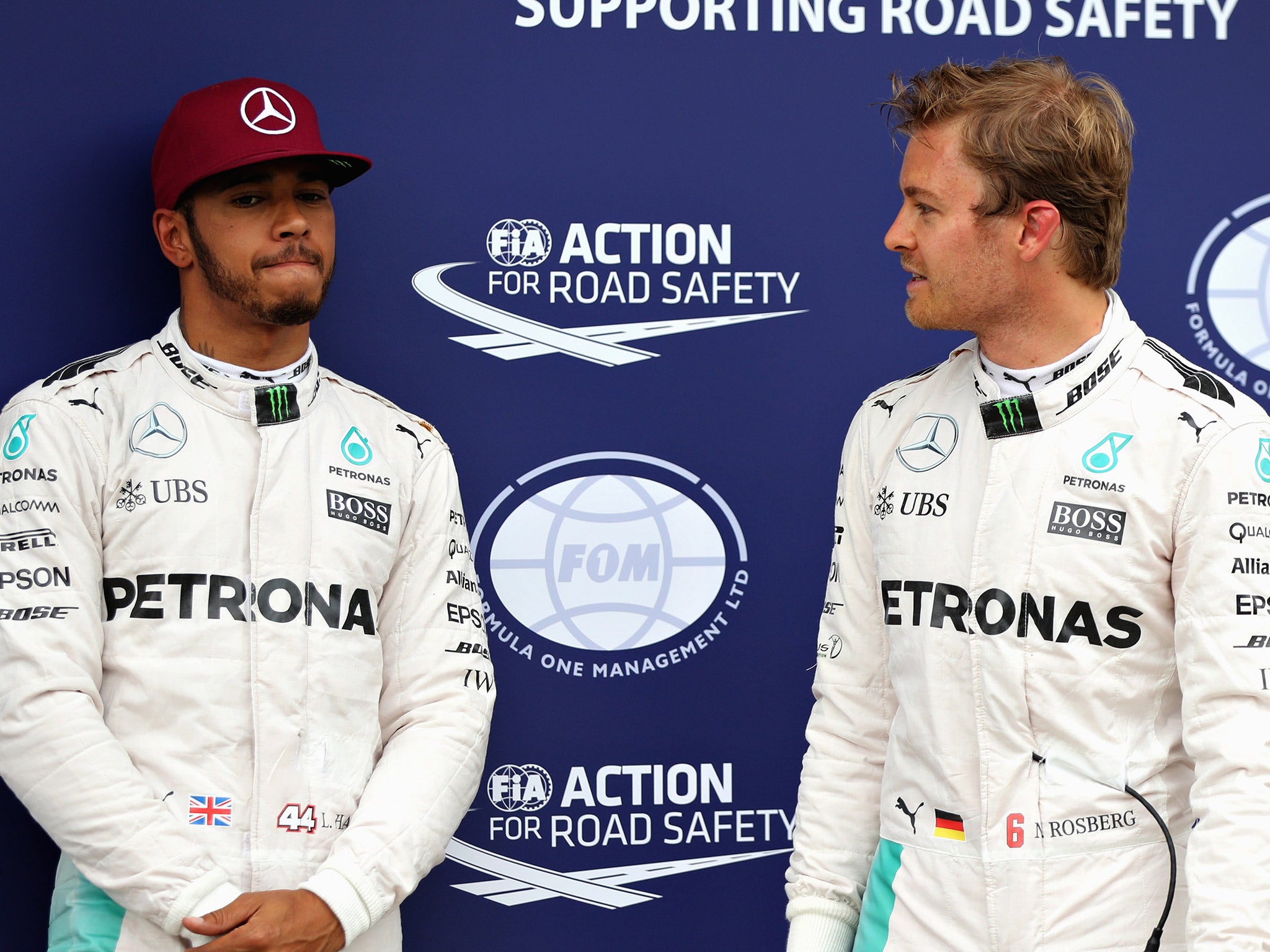 Lewis Hamilton speaks with Nico Rosberg after qualifying