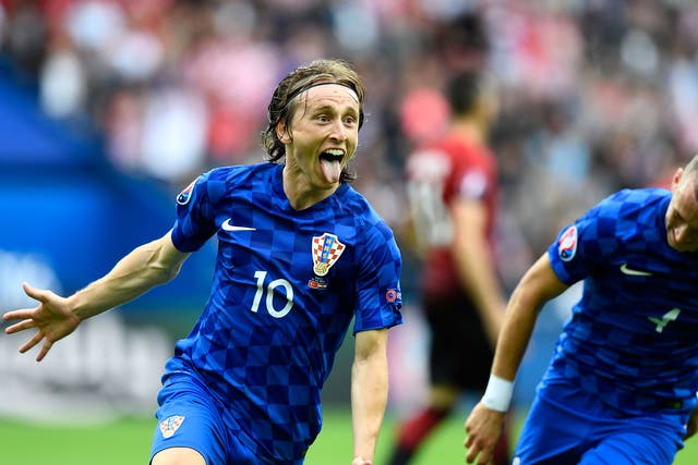 Luka Modric celebrates after giving Croatia the lead over Turkey with a wonder strike