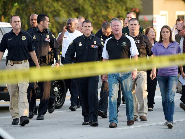 Orlando mayor Buddy Dyer attends the aftermath of the fatal shooting
