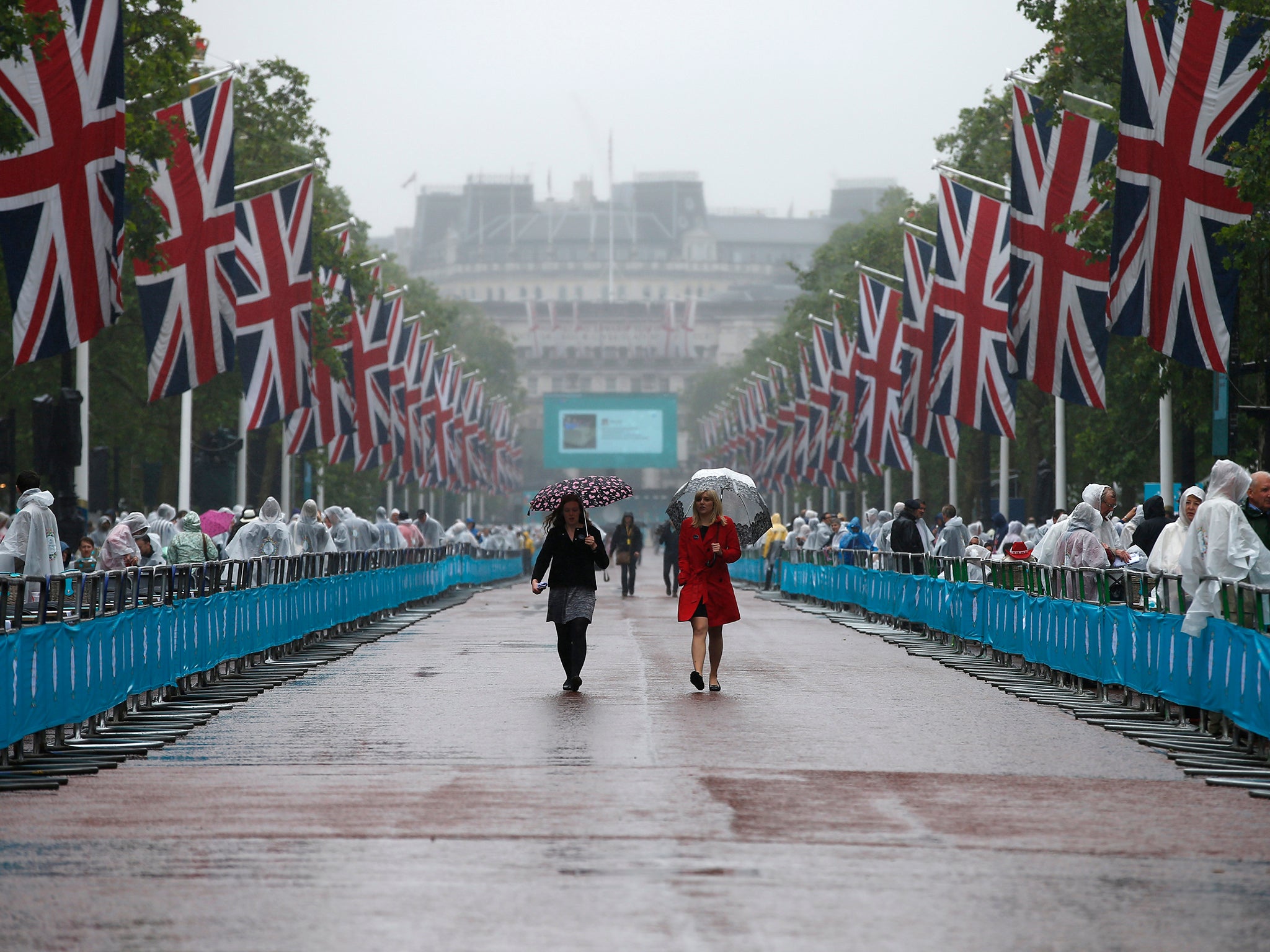 A street party to celebrate the Queen’s 90th birthday was hit by torrential downpours