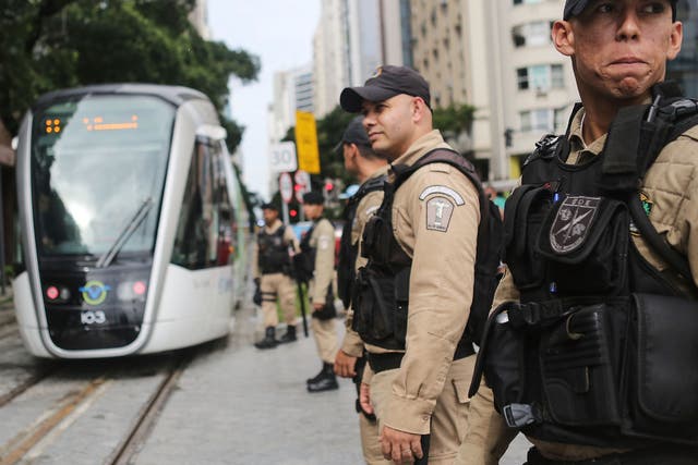  Rio police on patrol ahead of the Olympics near the city's new tram system