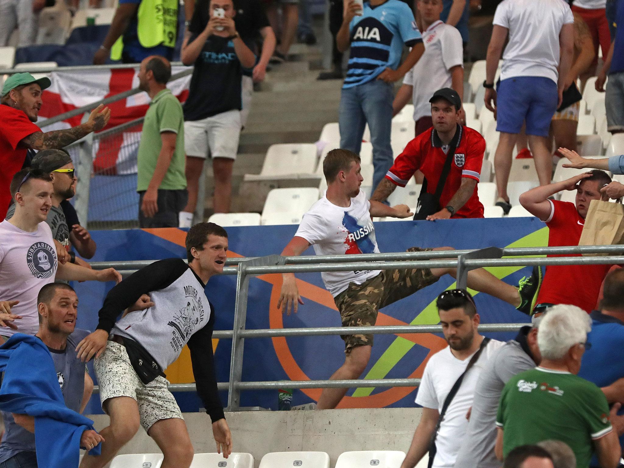 Russian supporters attack England fans at the end of the match in Marseille