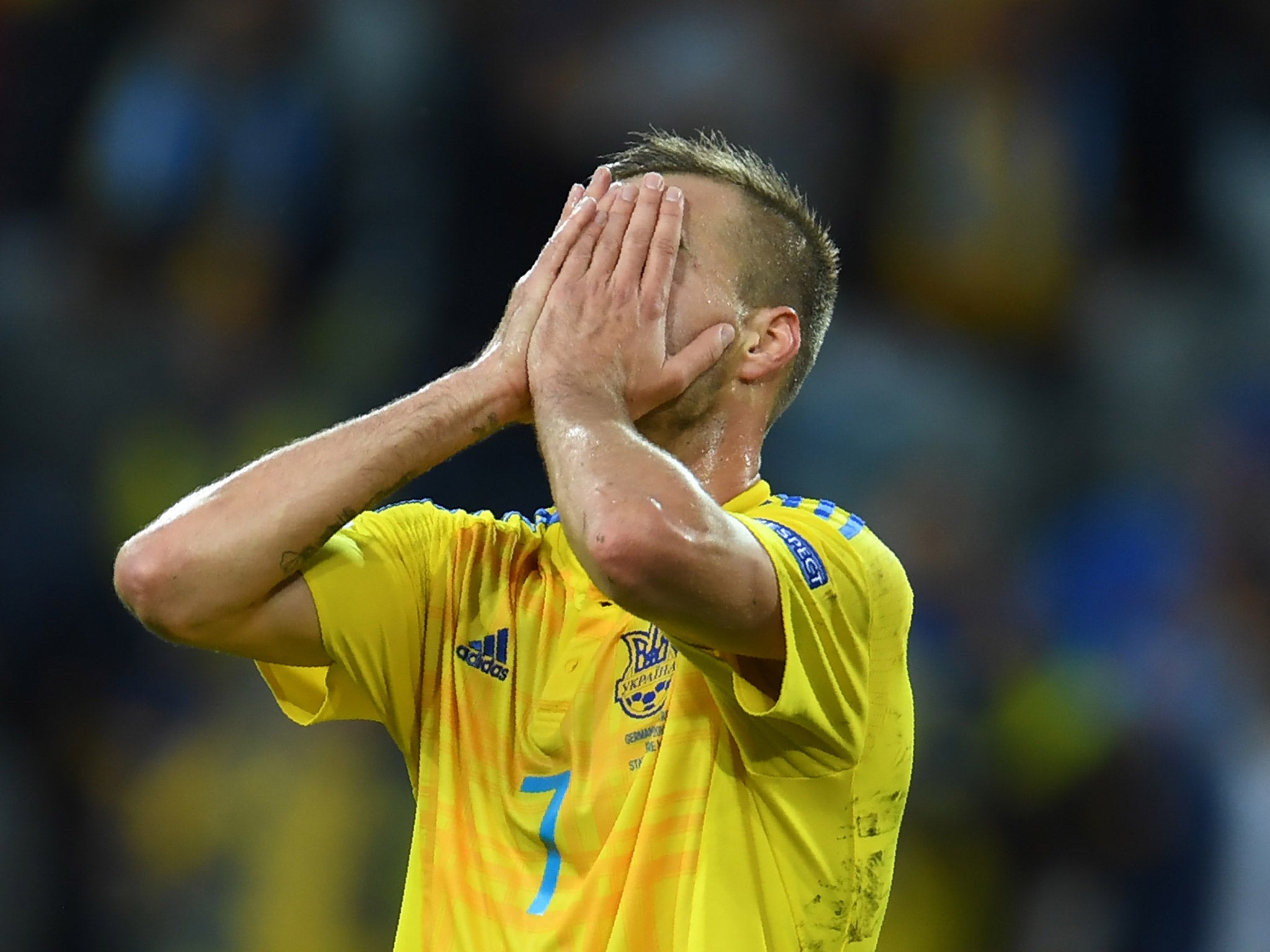 Andriy Yarmolenko reacts after missing a shot at goal