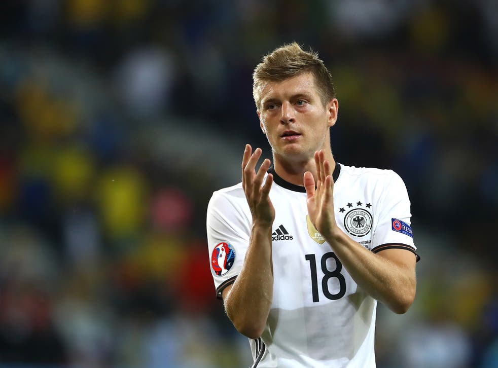 Toni Kroos applauds the Germany fans in Lille after the 2-0 victory over Ukraine