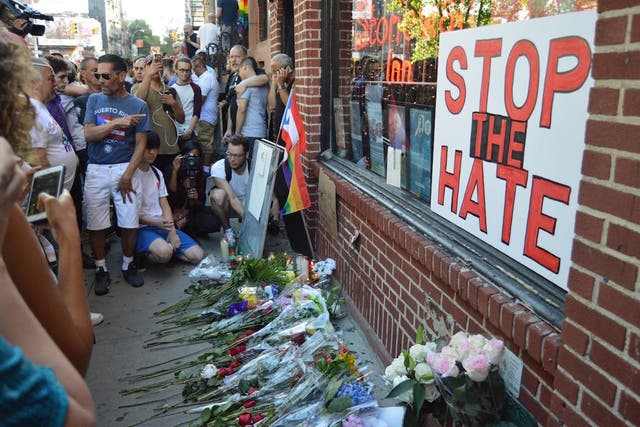New Yorkers mourn victims of the Orlando LGBT nightclub shooting.