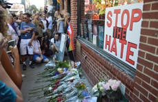 New York's LGBT community gathers outside iconic Stonewall Inn to mourn for Orlando