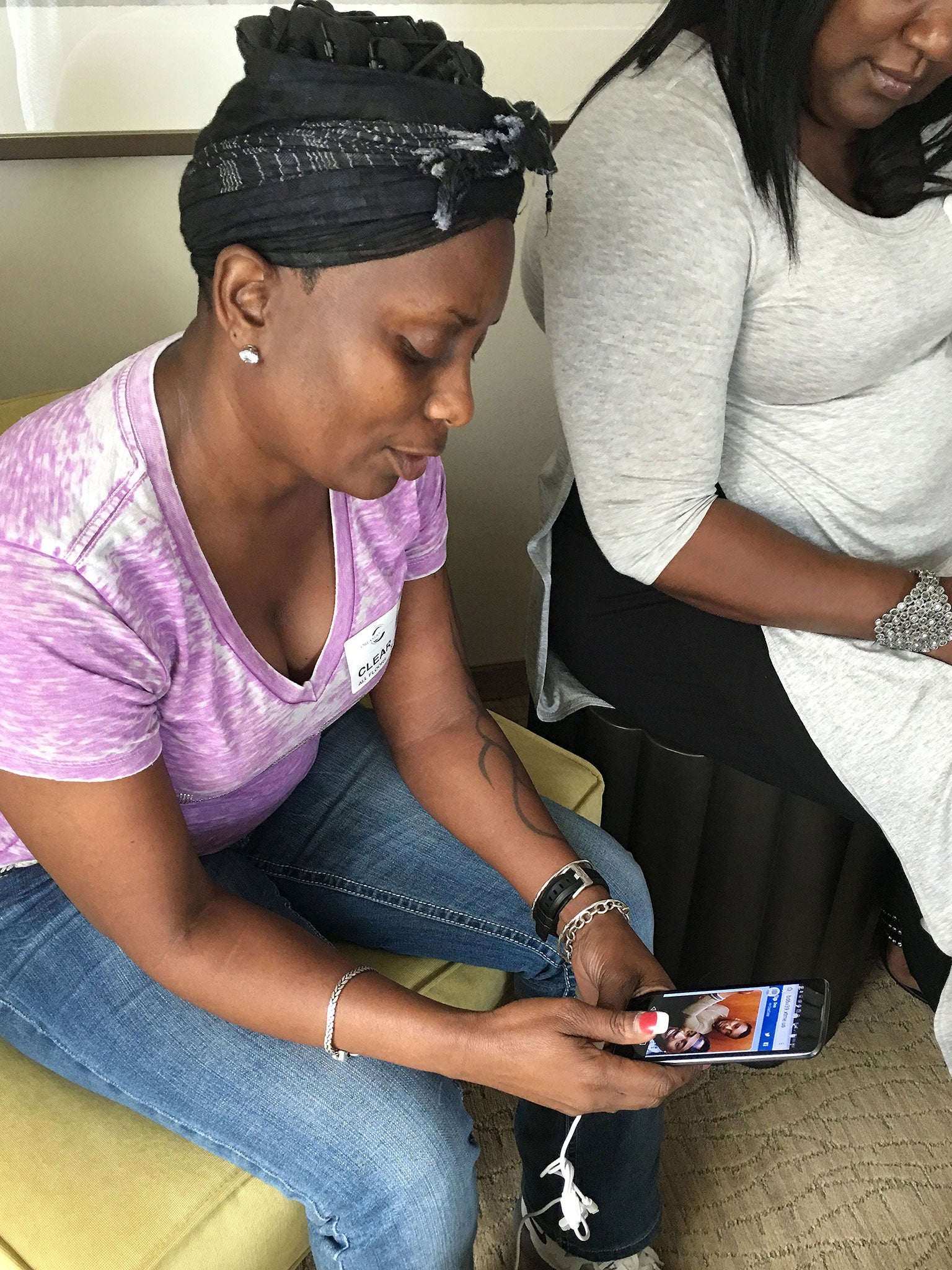 Mina Justice speaks to a reporter discussing texting with her son Eddie Justice who was in a bathroom at Club Pulse, Sunday June, 12, 2016