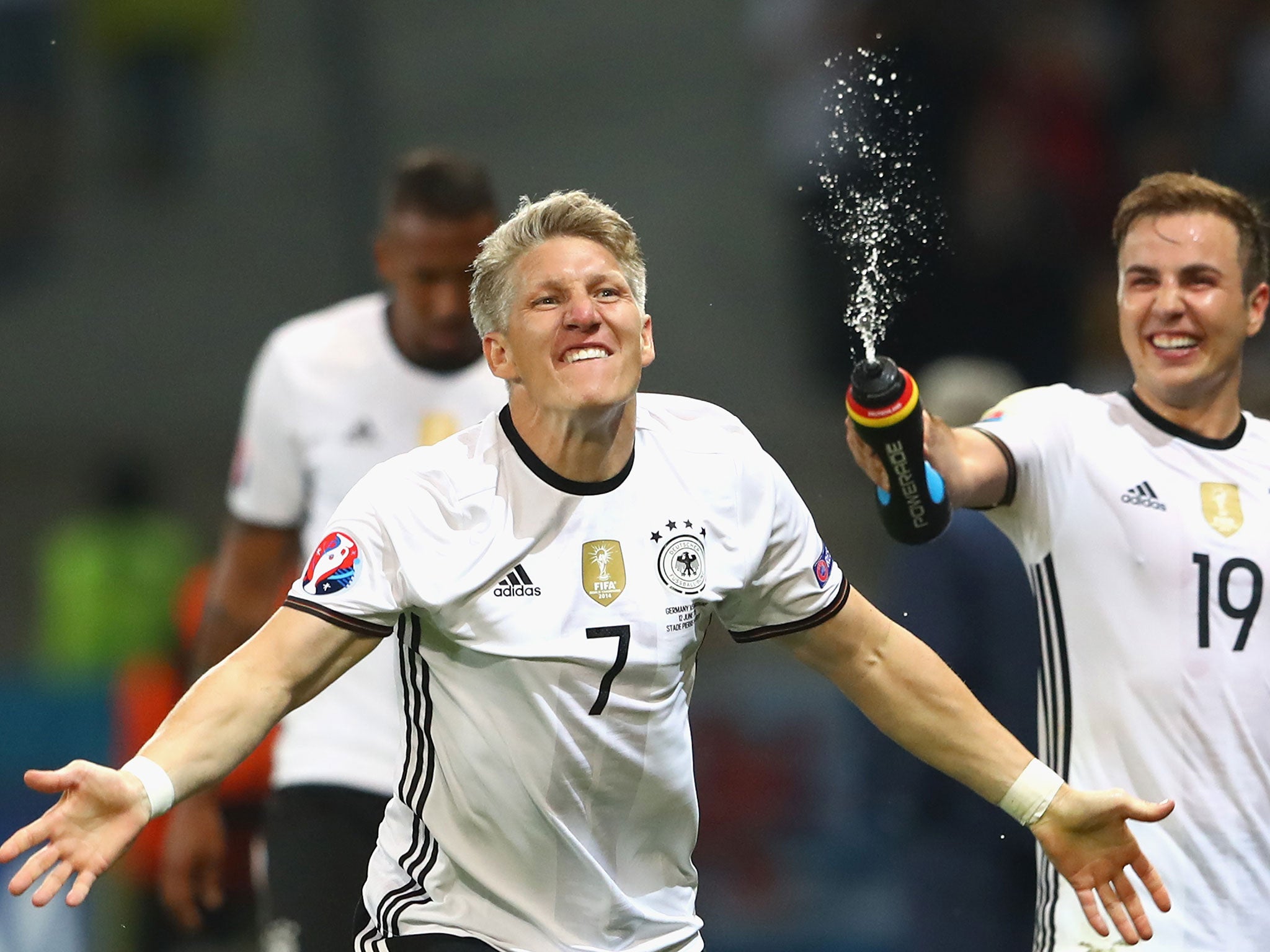 Bastian Schweinsteiger celebrates his goal for Germany against Ukraine