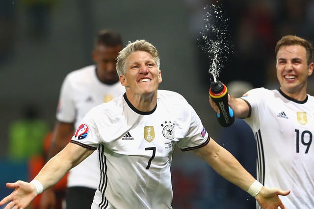 Bastian Schweinsteiger celebrates his goal for Germany against Ukraine