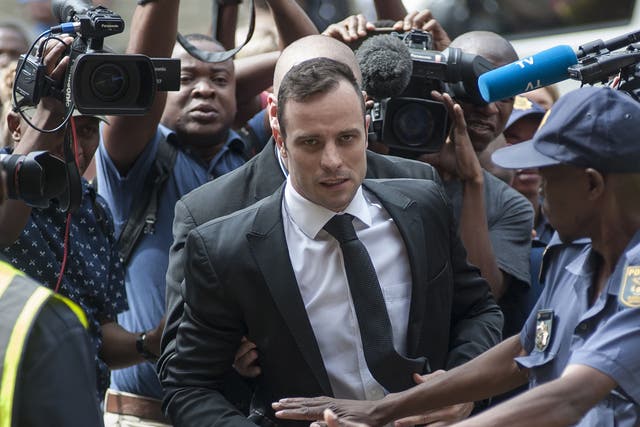 Oscar Pistorius arrives for a court appearance in December 2015 to apply for bail after his manslaughter conviction was upgraded to murder