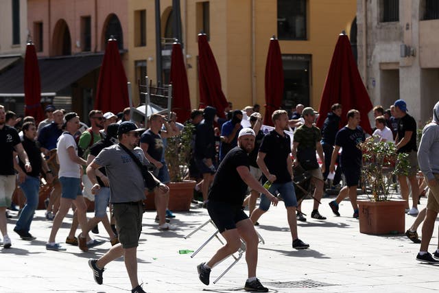 A gang of Russian fans charge towards English supporters in Marseille