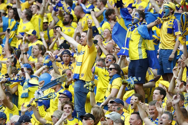 Sweden fans celebrate their first goal against the Republic of Ireland