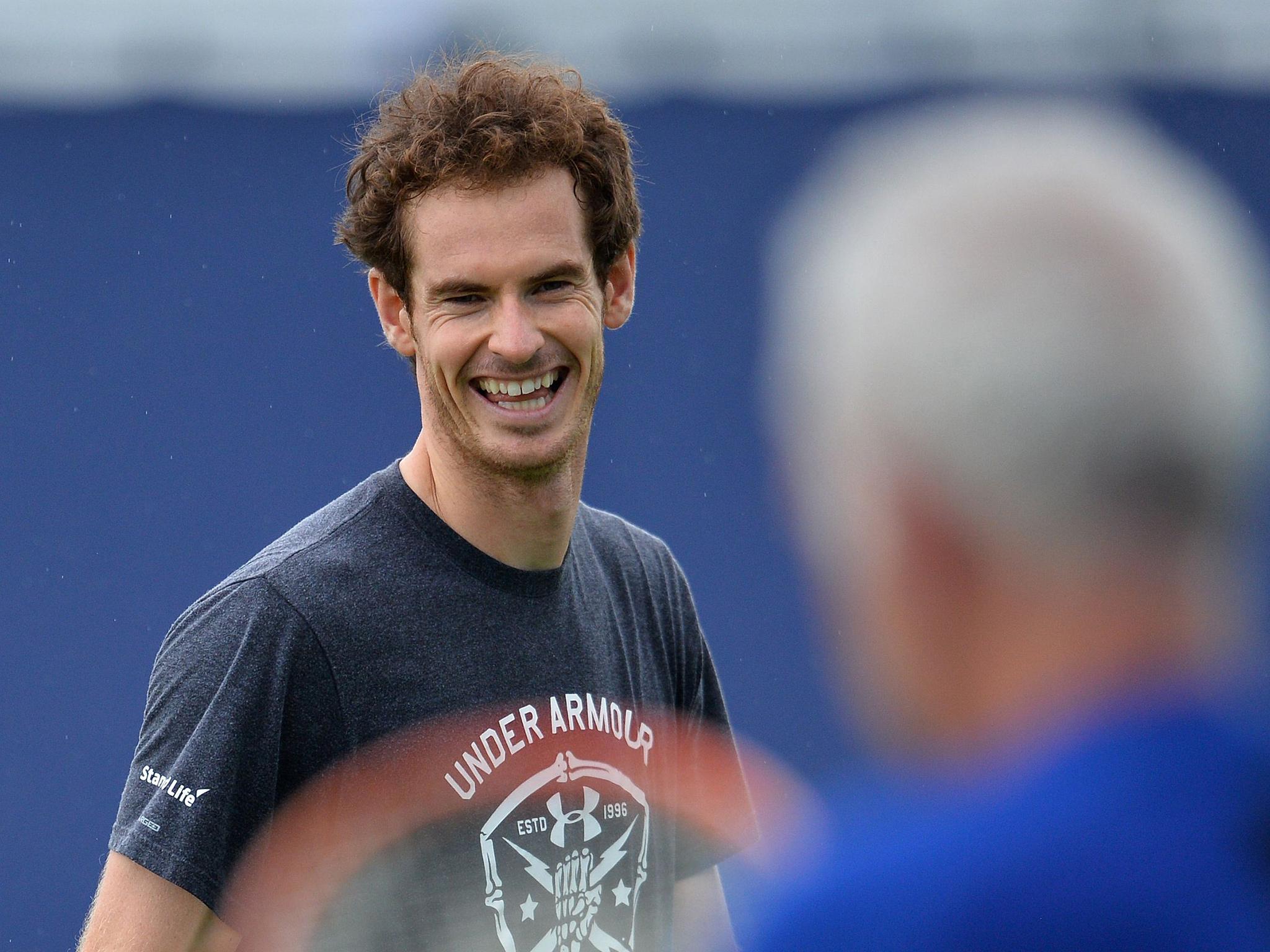 Andy Murray enjoys a joke with John McEnroe