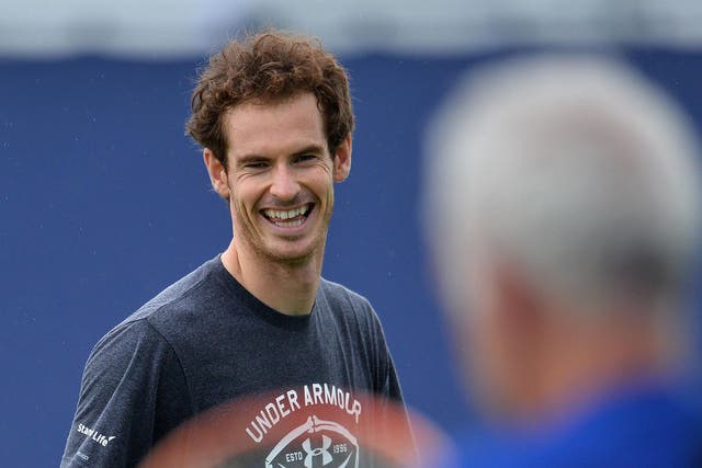 Andy Murray enjoys a joke with John McEnroe
