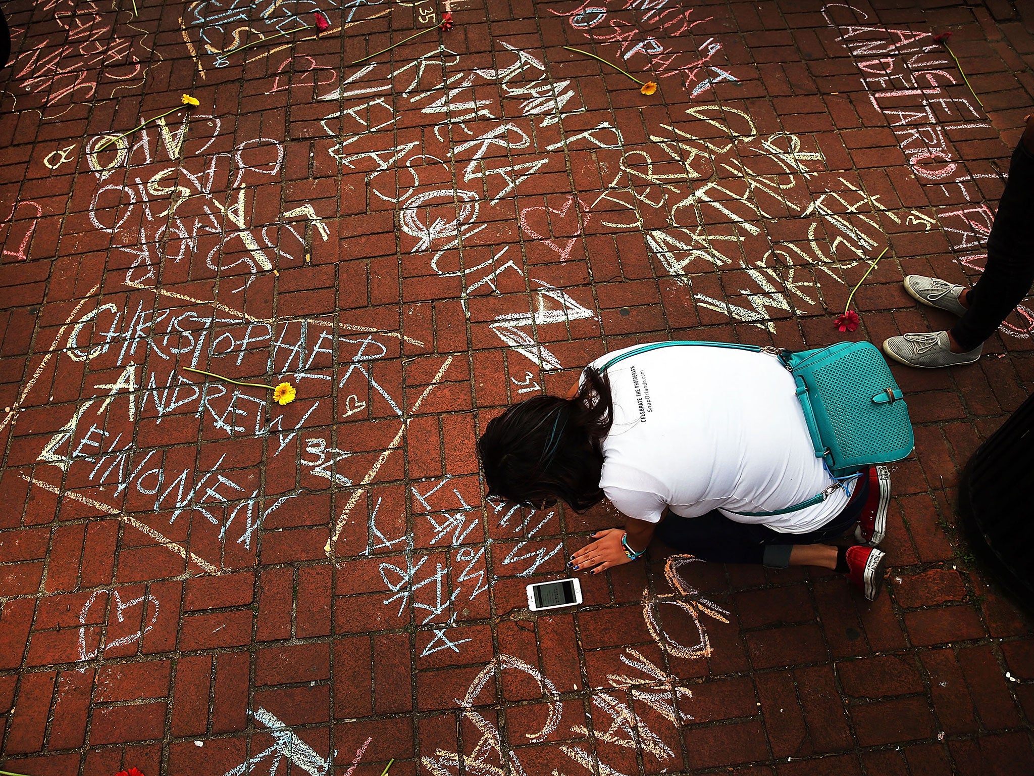 A tribute names the 49 murdered in the Pulse nightclub shooting