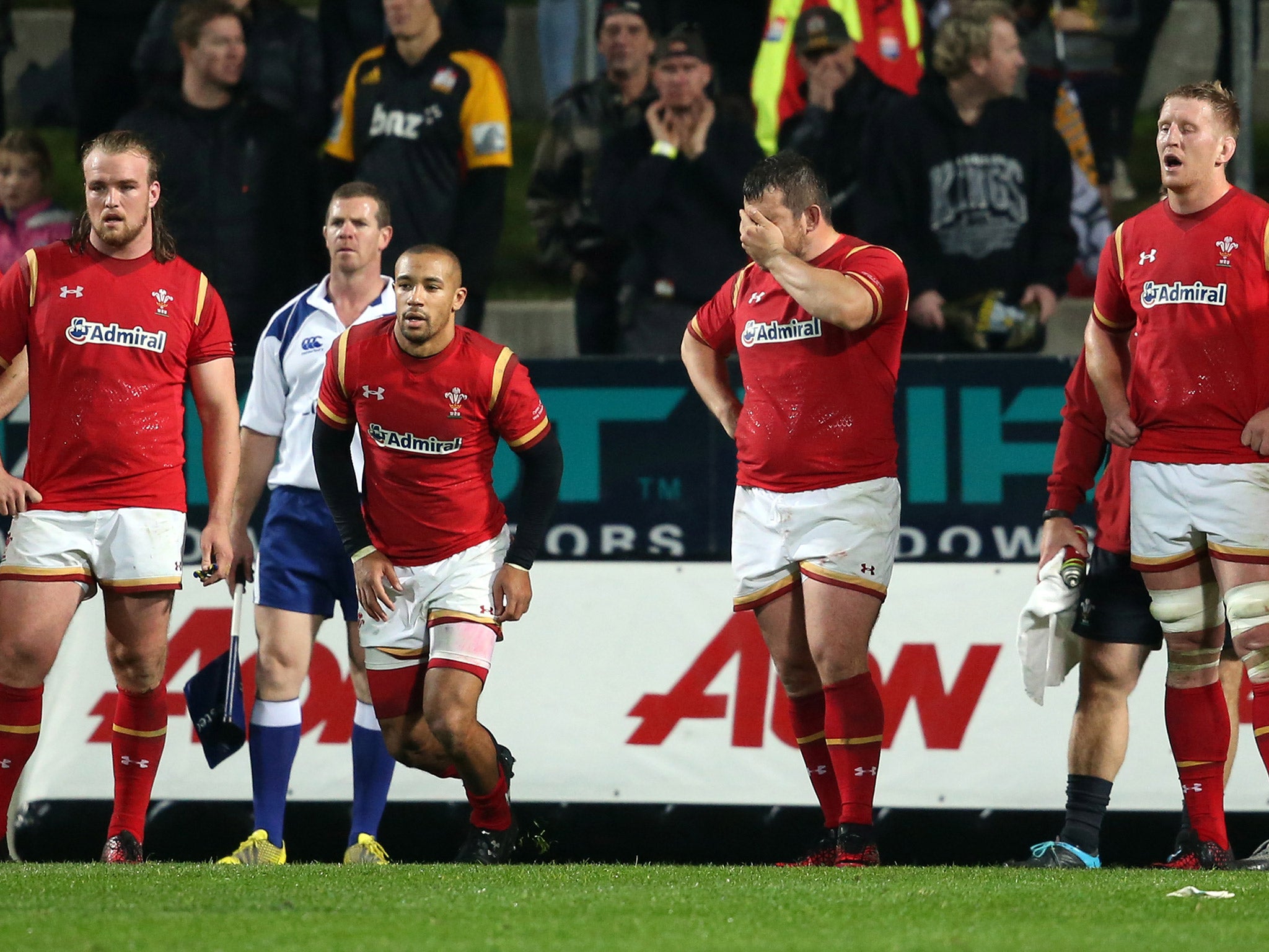Wales players appear dejected after suffering a heavy 40-7 defeat by the Chiefs