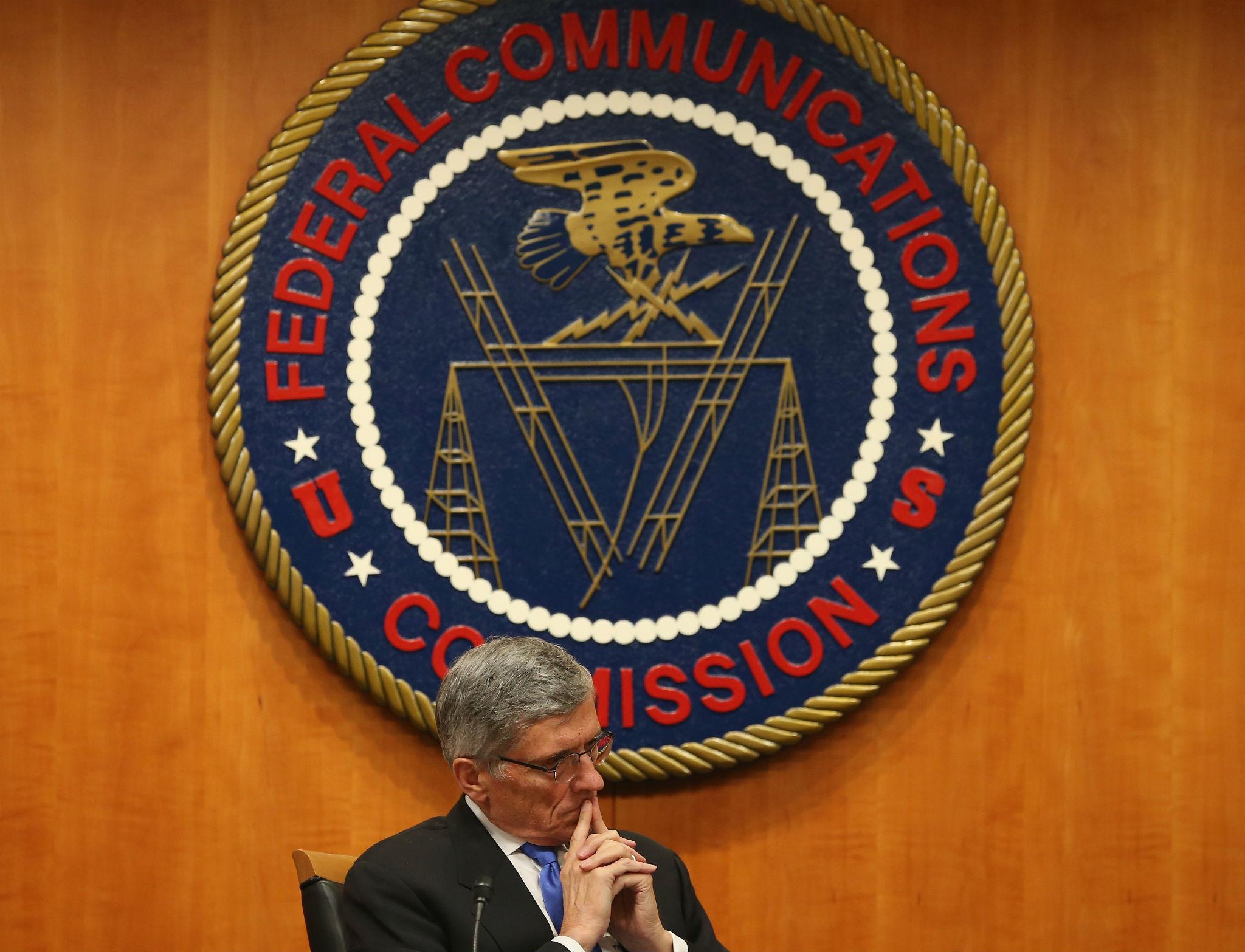 FCC Chairman Tom Wheeler listens to testimony before the commission voted to uphold net neutrality in February, 2015