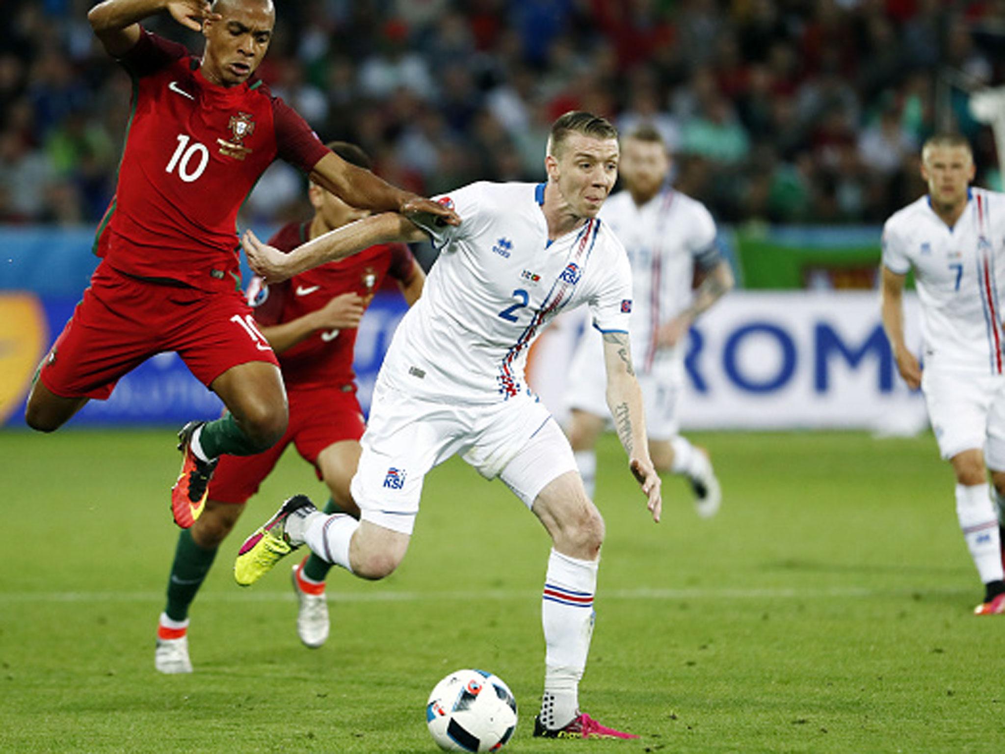 &#13;
Birkir Saevarsson played his part in keeping Portugal's forward line at bay (Getty)&#13;