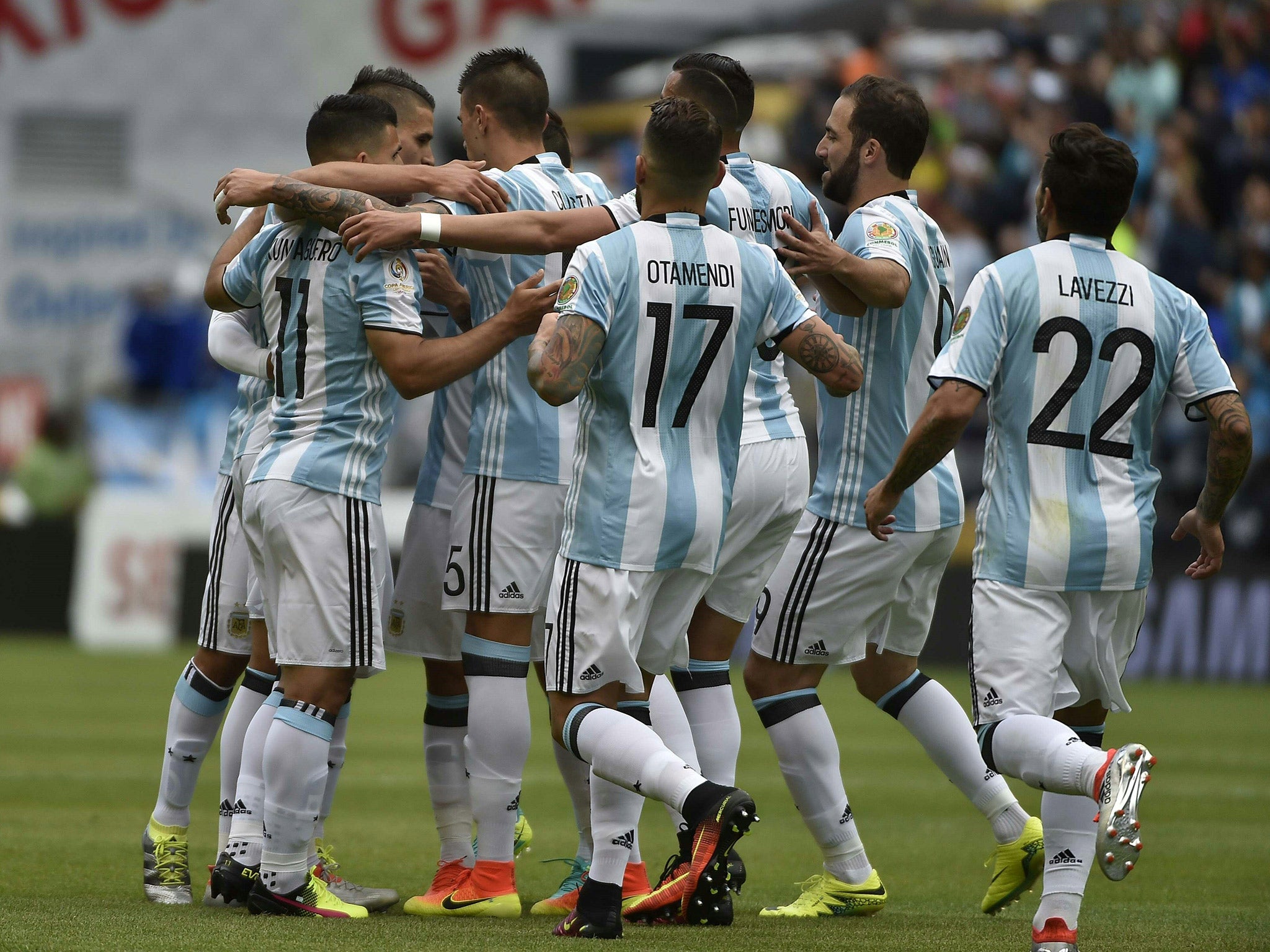 Argentina players celebrate after Erik Lamela's opening goal in the 3-0 win over Bolivia