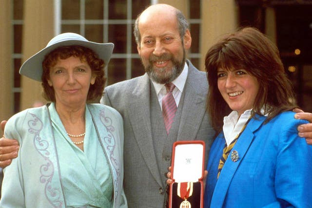 Sir Clement Freud with wife and daughter outside the Buckingham Palace, 1987
