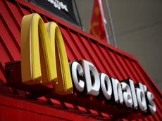 McDonald's employee jumps through drive-thru window to save customer 