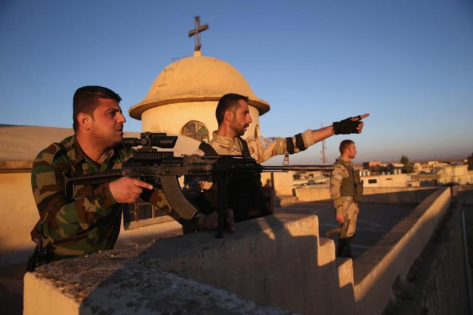 The Peshmerga occupy an abandoned Iraqi town near the frontline: John Moore/Getty