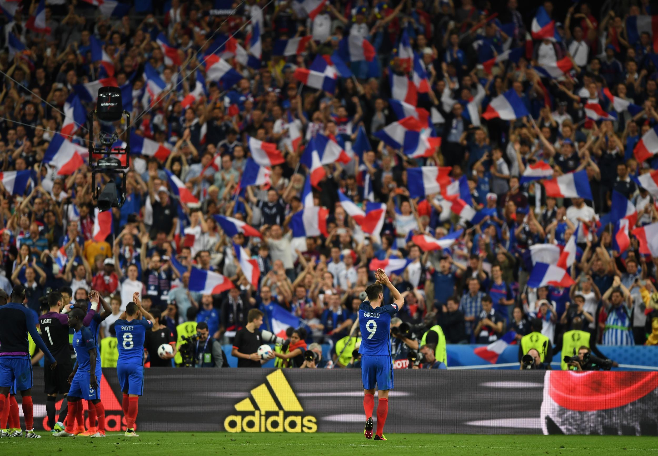 France's players applauding the Stade de France crowd on Friday