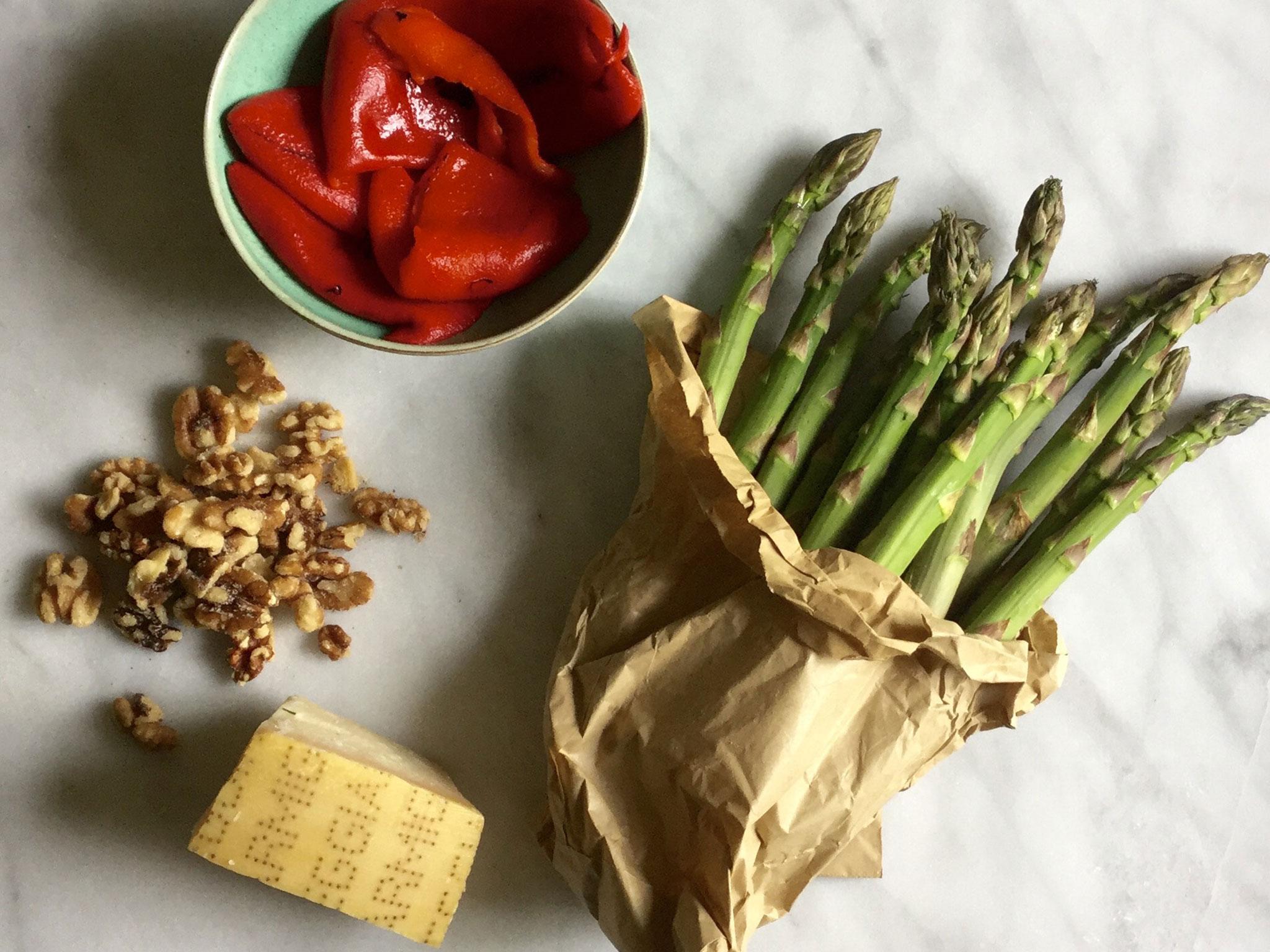 Julia teams asparagus with walnuts, roasted peppers and parmesan cheese