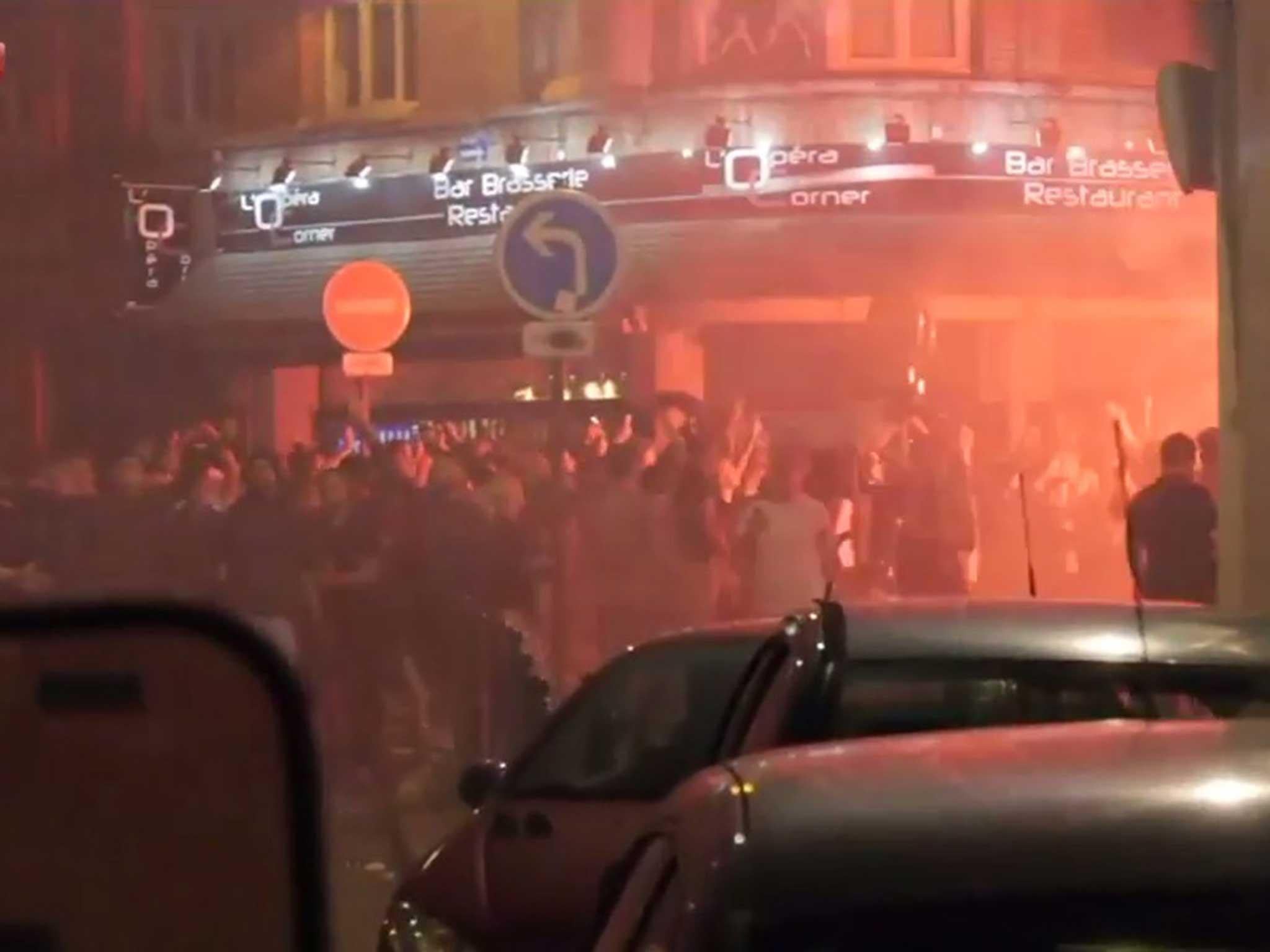England fans light flares in the streets of Lille