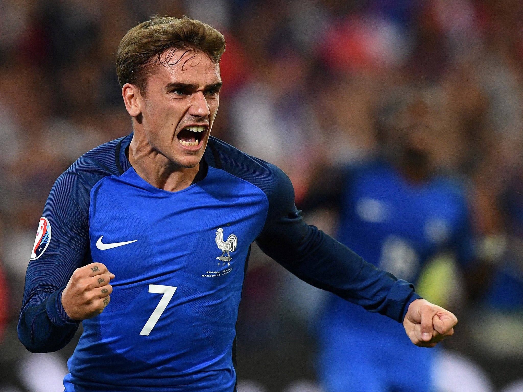 Antoine Griezmann celebrates after giving France the lead against Albania