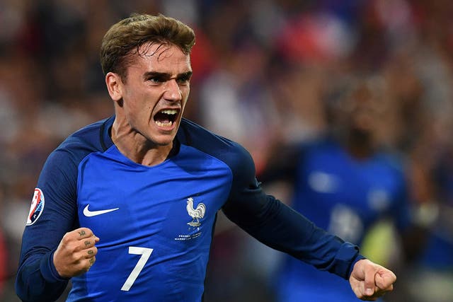 Antoine Griezmann celebrates after giving France the lead against Albania