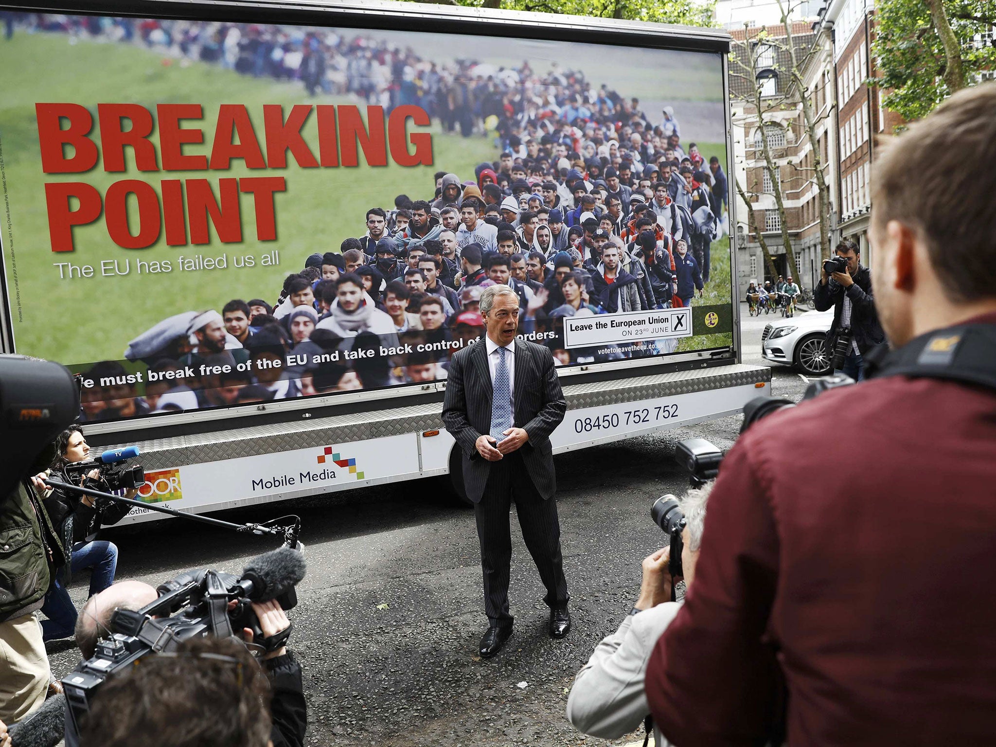 Ukip leader Nigel Farage poses during a media launch for an EU referendum poster in London, Britain June 16, 2016