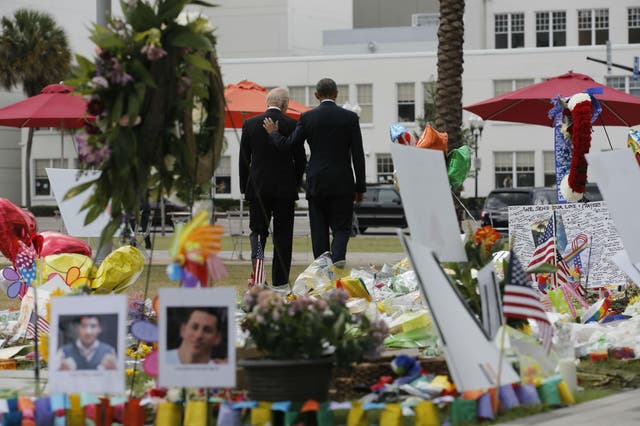 Mr Obama and Mr Biden visited a makeshift memorial in Orlando