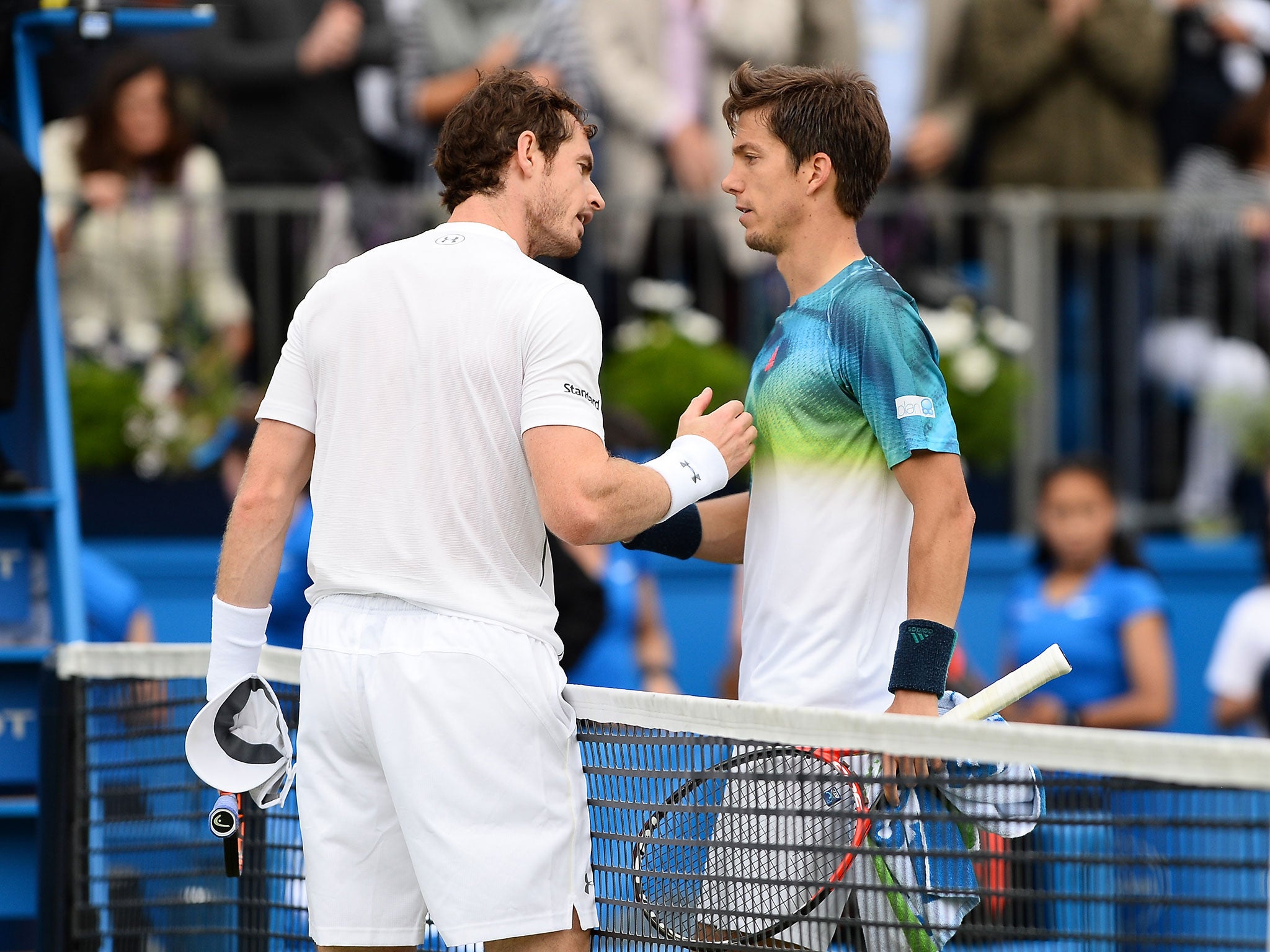 Andy Murray and Aljaz Bedene share words at the conclusion of Thursday's match