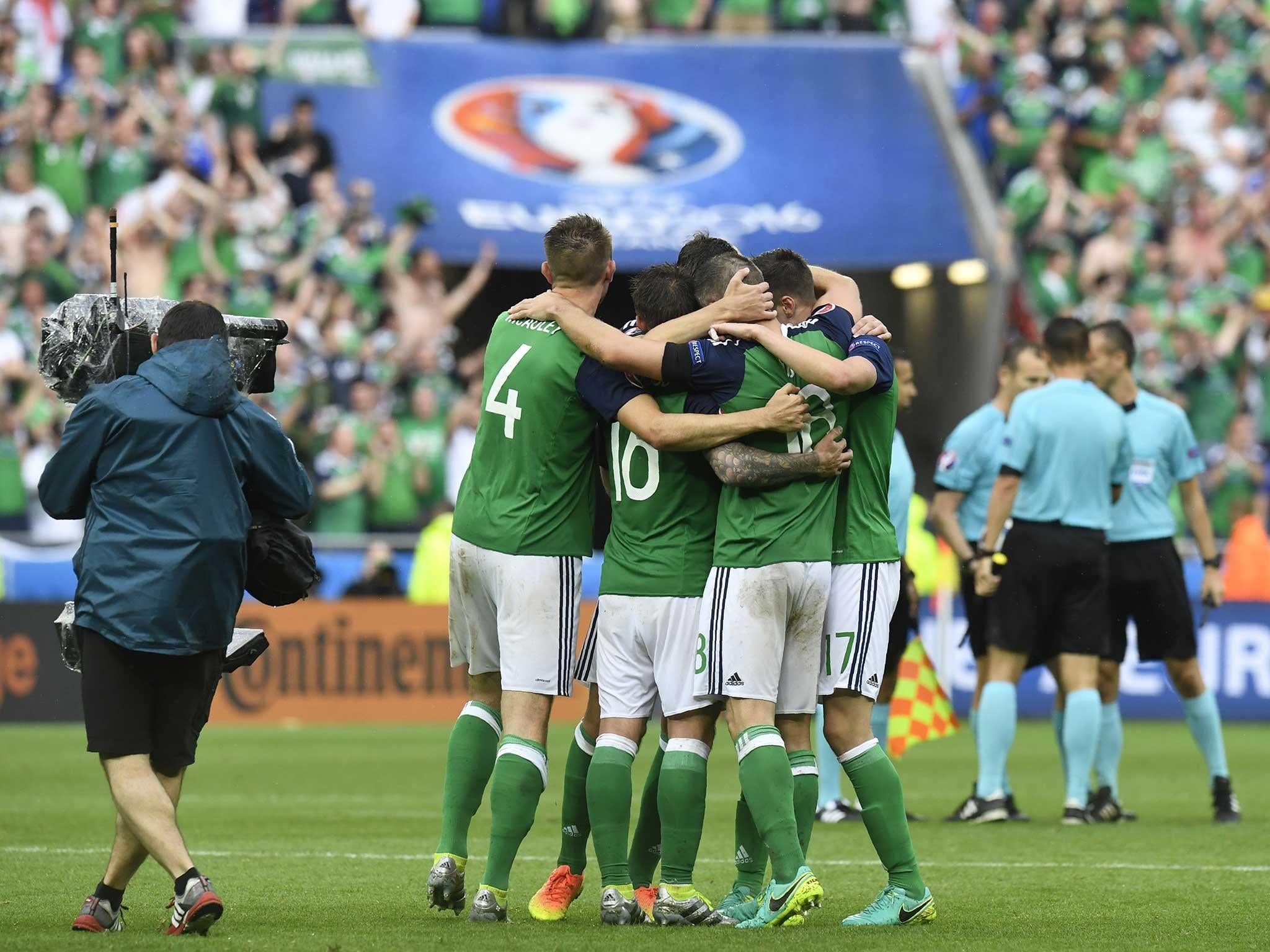 Northern Ireland celebrate Gareth McAuley's opener