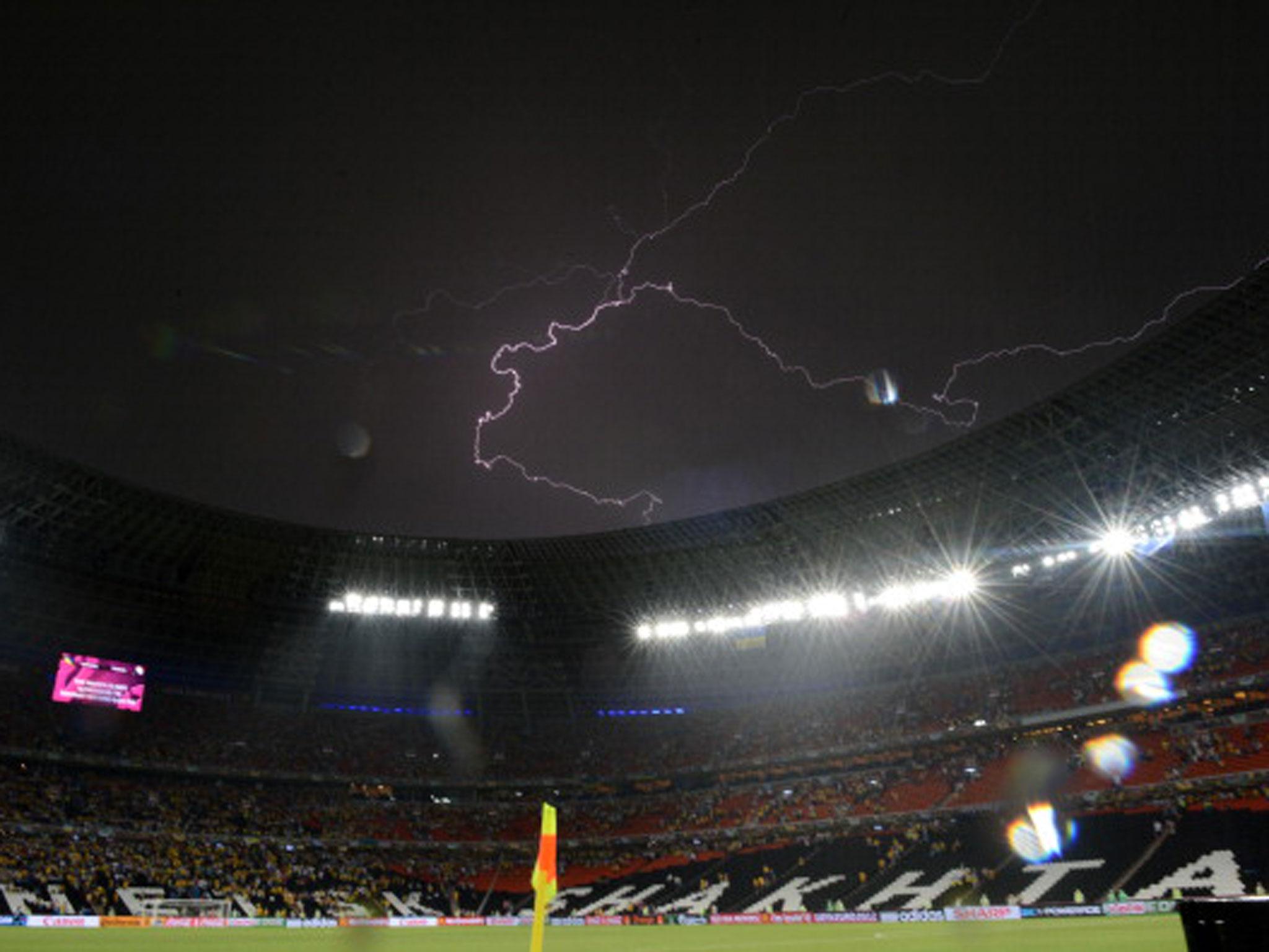 Bolts of lightning illuminate the night sky in Donetsk in 2012 (Getty)