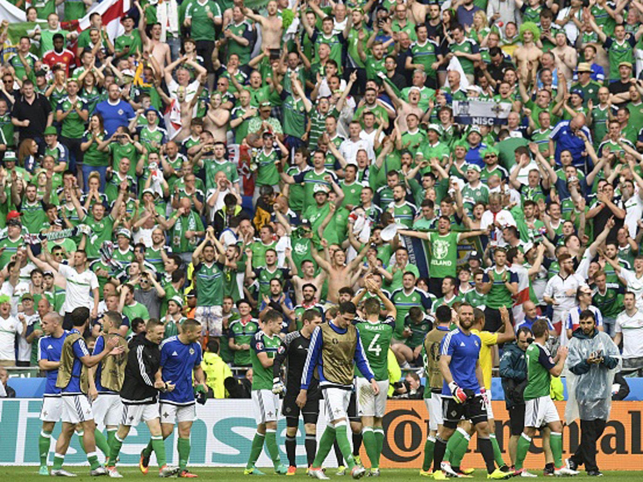 Northern Ireland supporters salute their players after the 2-0 victory over Ukraine on Thursday (Getty)