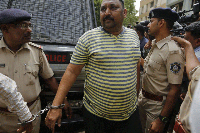 n Indian man convicted for the 2002 Gujarat riots is brought to court in Ahmadabad, India, Friday, June 17, 2016.