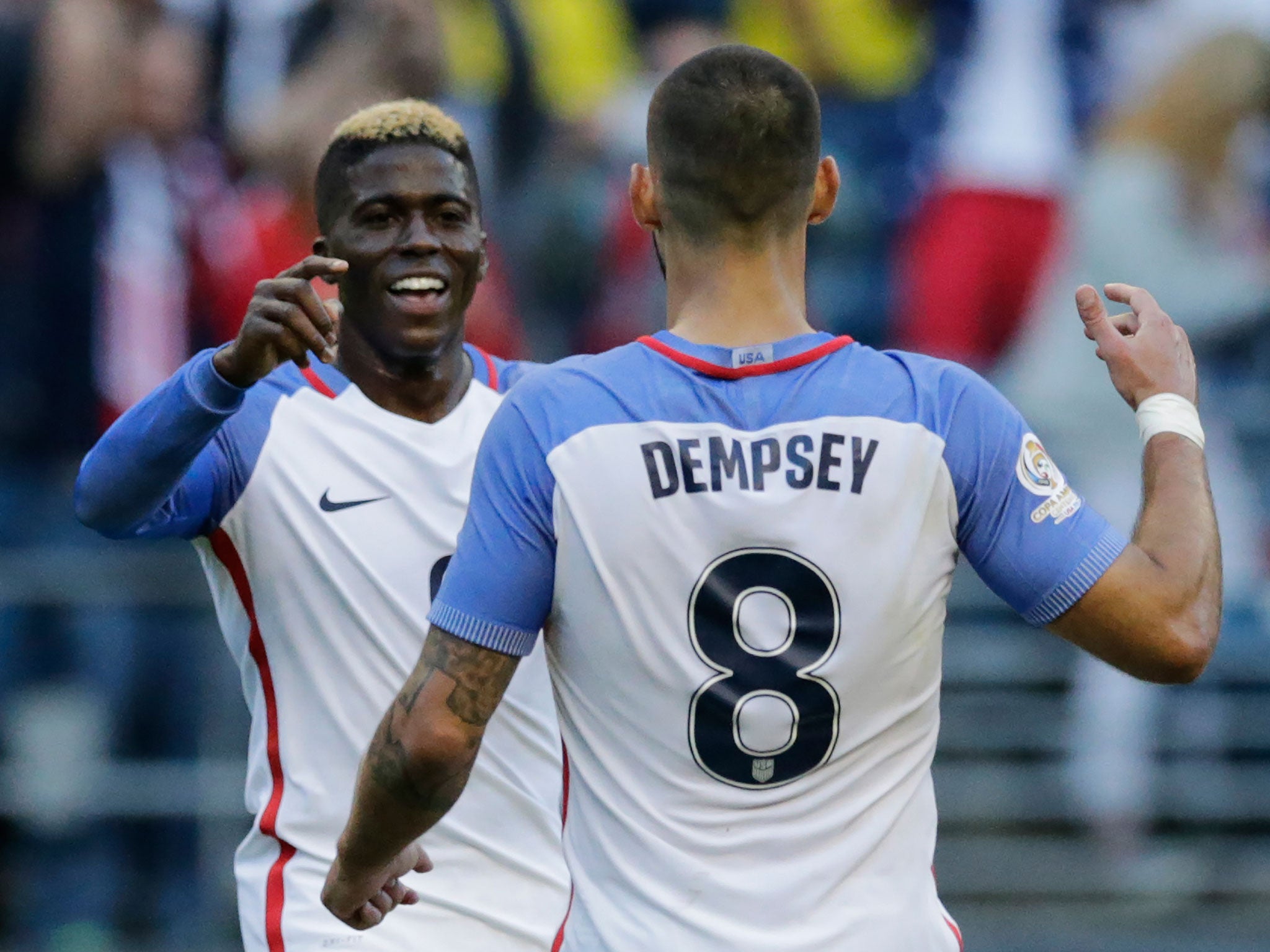 Gyasi Zardes celebrates with Clint Dempsey after scoring against Ecuador