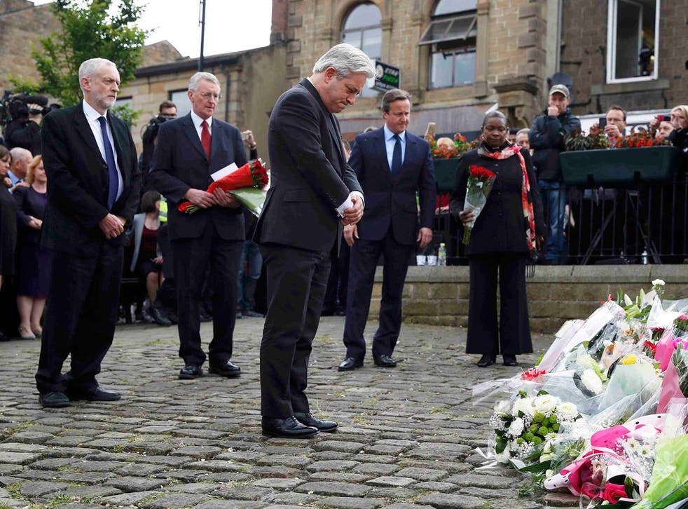John Bercow, speaker of the House of Commons pays his respect as he stands with Britain's Prime Minister David Cameron and Labour Party leader Jeremy Corbyn near the scene where Labour Member of Parliament Jo Cox was killed in Birstall