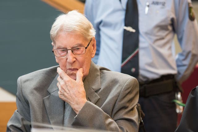 94-year-old former SS sergeant Reinhold Hanning sits in the courtroom in Detmold