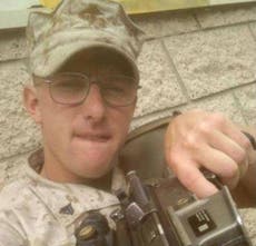 Marines under investigation for posting picture on Facebook of gun with anti-gay slogan