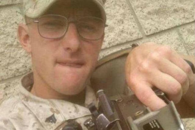 Both the marine that posed and the marine that posted the picture have been identified