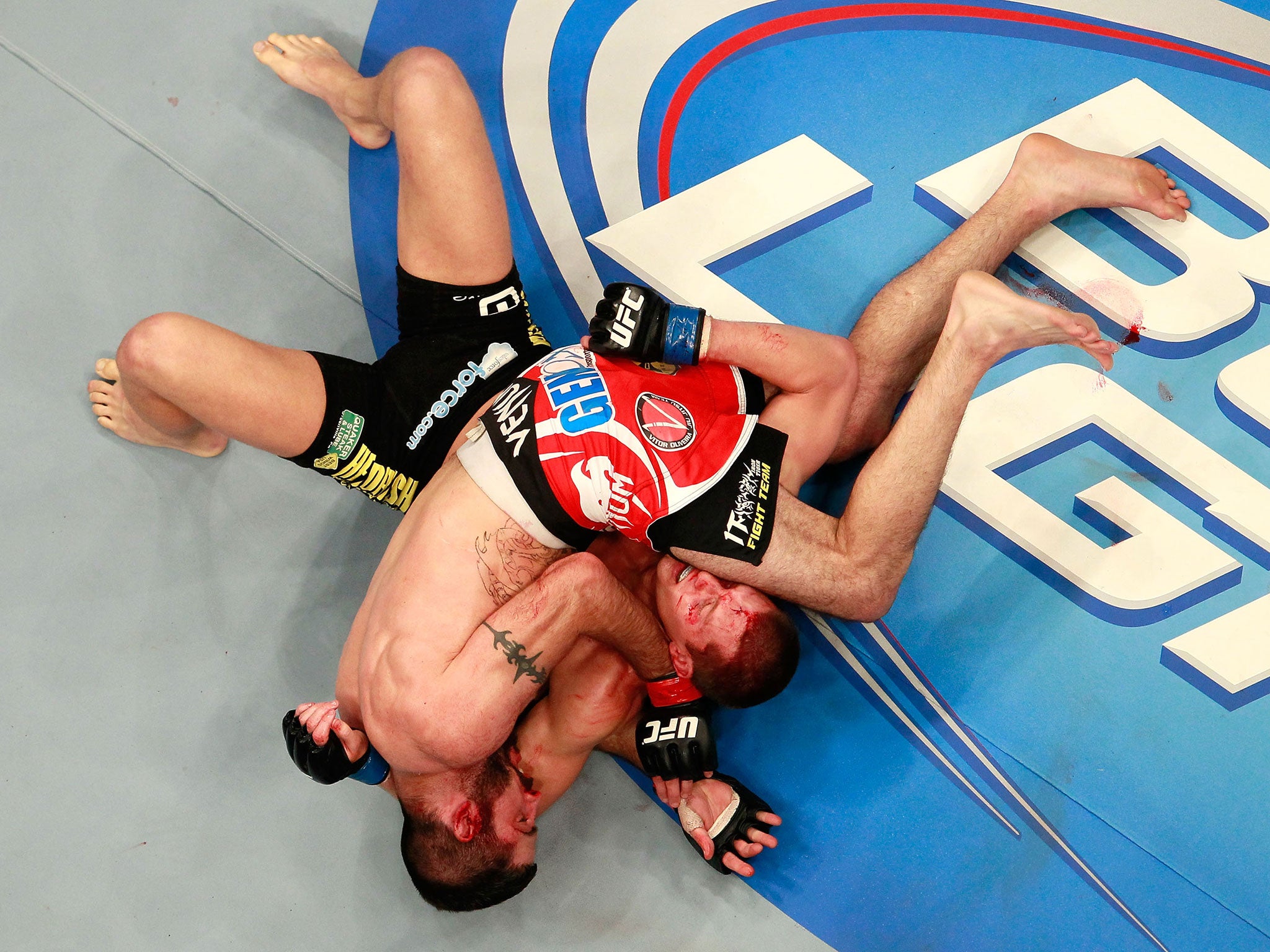 Matt Brown (top) grapples with Stephen Thompson during their welterweight bout for UFC 145 at Philips Arena on April 21, 2012